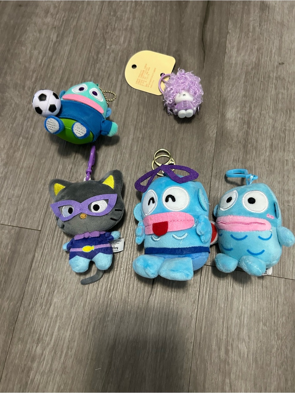 Character Keychain Set These plush items appear to be Sanrio Hangyodon character